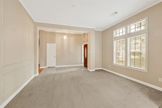 an empty room with windows