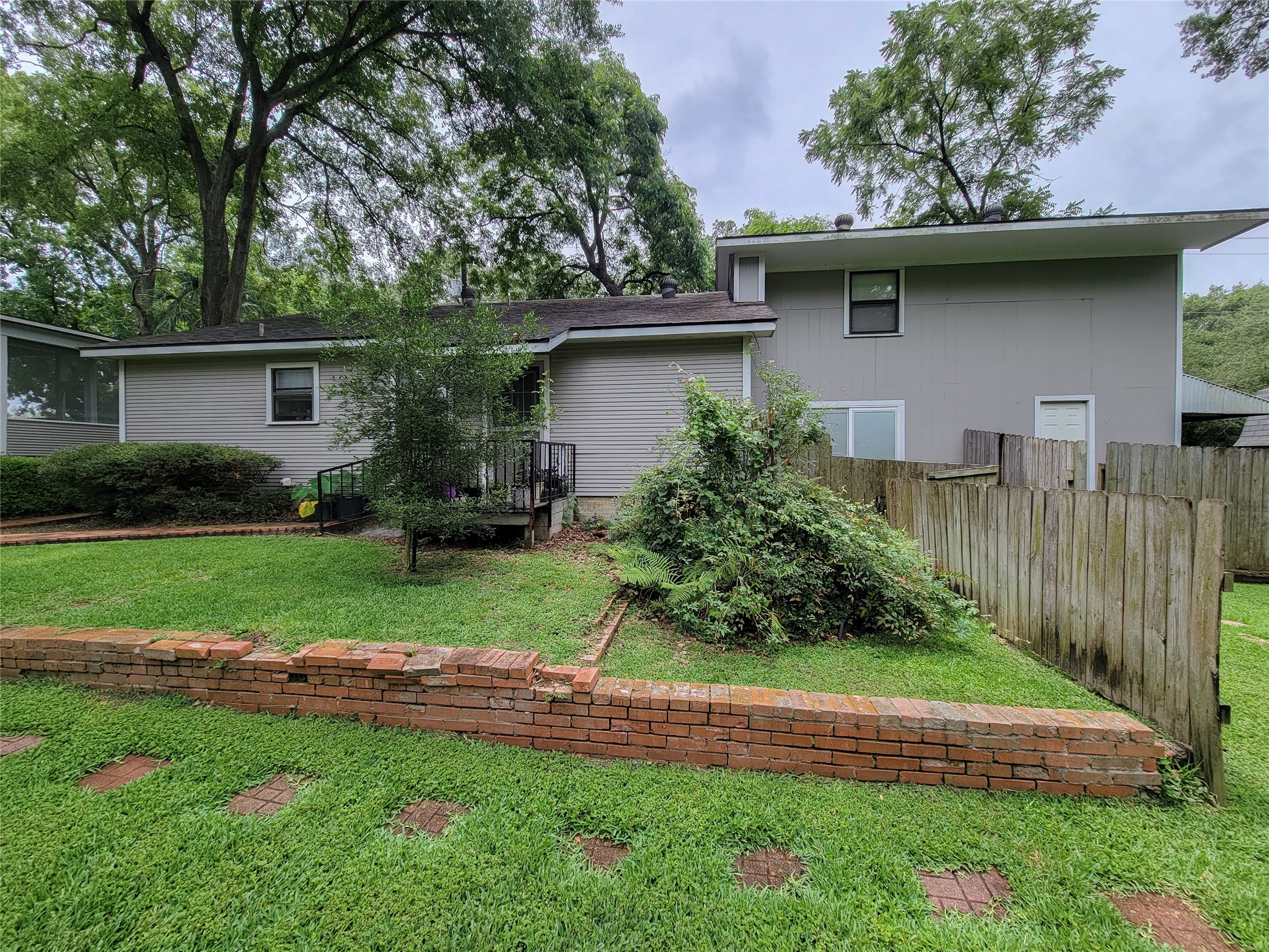 1406 Key Street Brenham, TX 77833 - Photo 43 of 50 Guest Suite B: Furnished 2-story w/living room,kitchen,bathroom, upstairs bedroom, small fenced patio accessable to backyard space.. approx 720SF addition