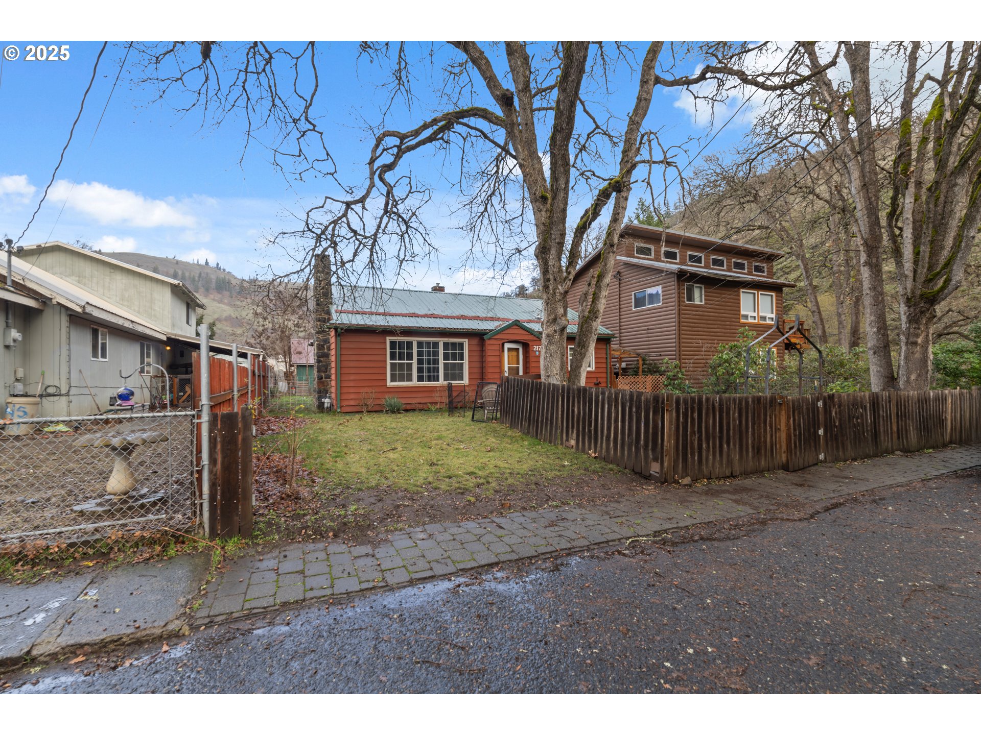 217 2nd Street Klickitat, WA 98628 - Photo 4 of 28 a view of a yard in front of a house