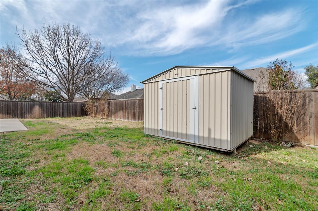 2617 Hollow Ridge Drive Denton, TX 76210 - Photo 31 of 32 a view of a house with a yard