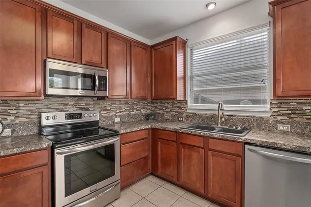 $355,000 | 2617 Hollow Ridge Drive, Denton, TX 76210