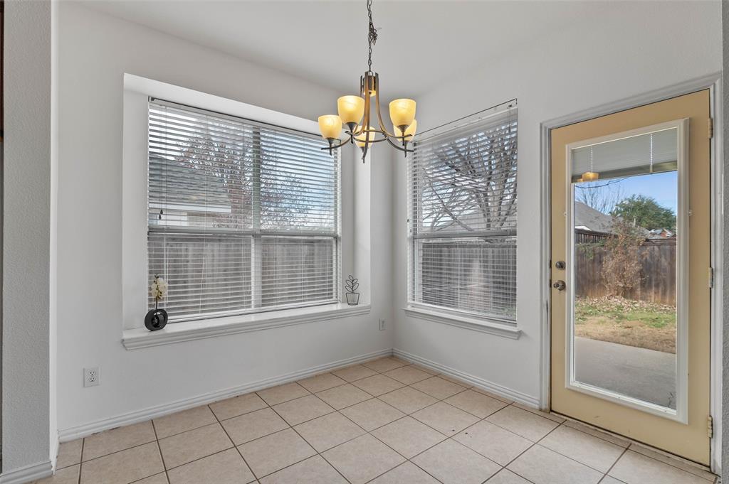2617 Hollow Ridge Drive Denton, TX 76210 - Photo 9 of 32 a view of an empty room with a window