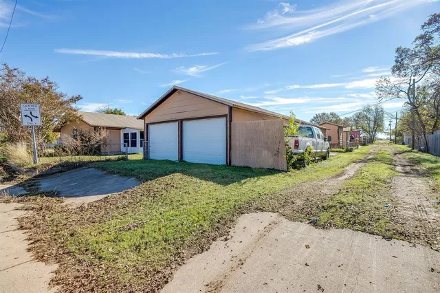 a bathroom with a sink and a yard