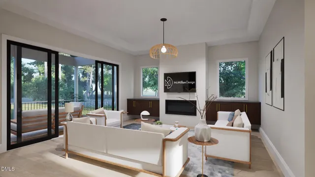 a living room with fireplace furniture and a floor to ceiling window