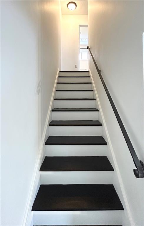 583 Cumberland Road Pittsburgh, PA 15237 - Photo 12 of 25 Refinished hardwood stairs