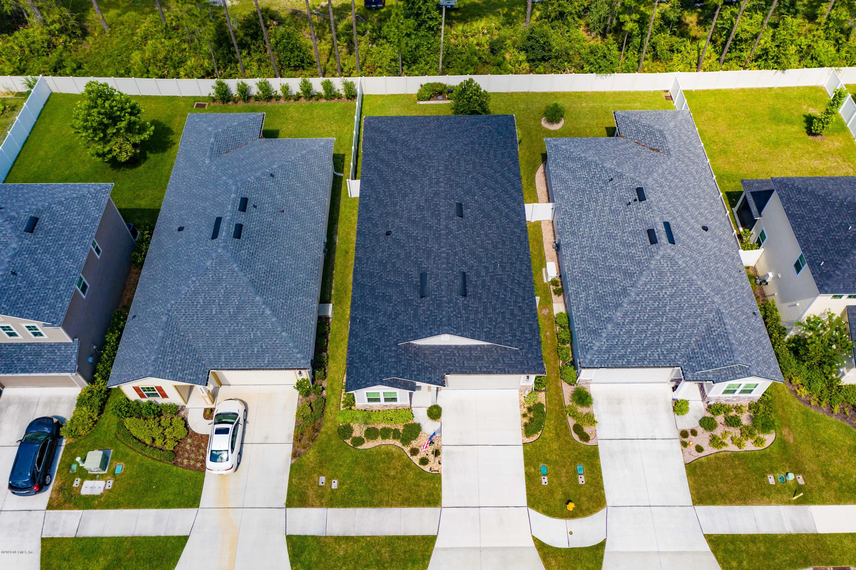 6642 Azalea Park Road Jacksonville, FL 32259 - Photo 2 of 42 an aerial view of house with a yard