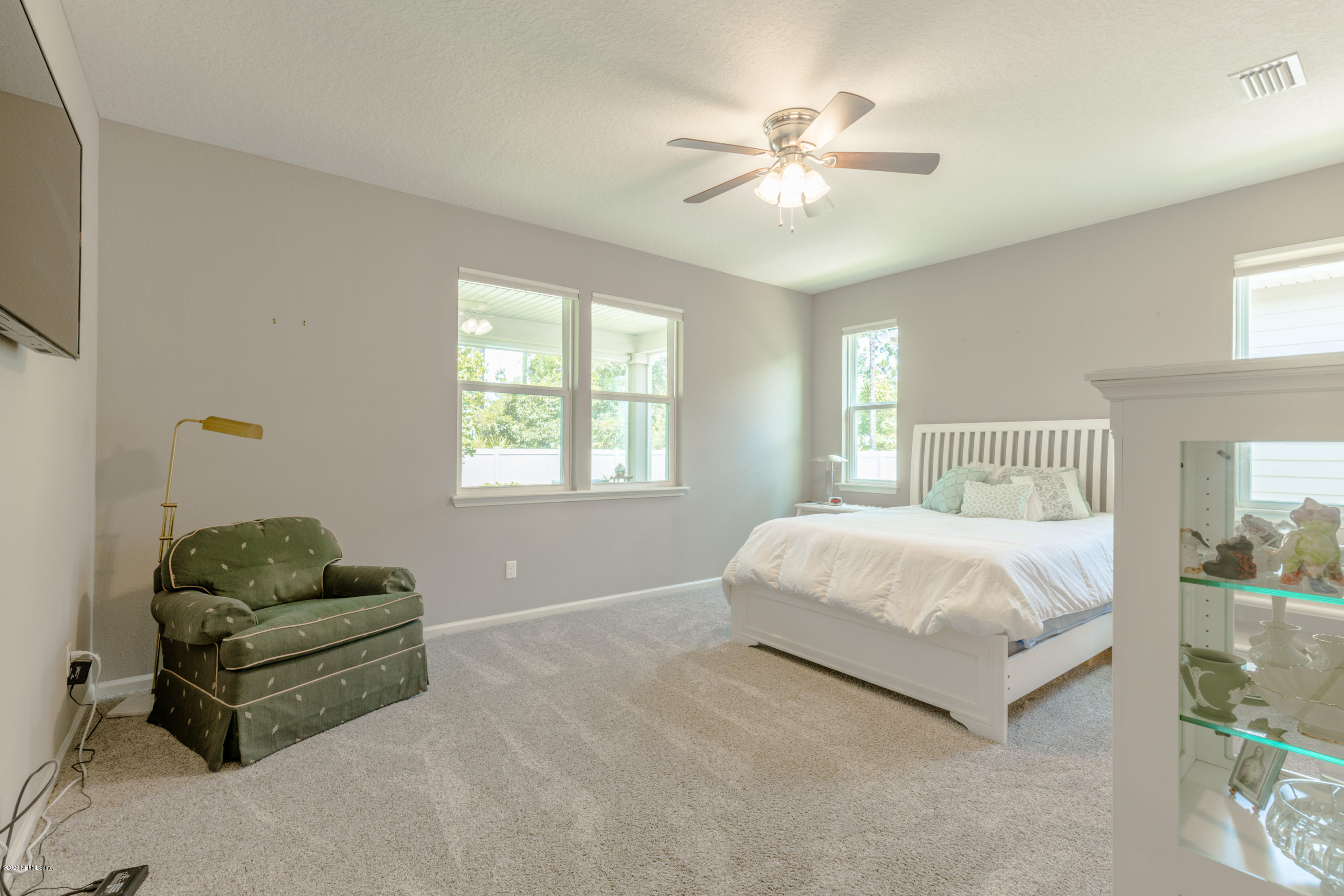 6642 Azalea Park Road Jacksonville, FL 32259 - Photo 20 of 42 a bedroom with a bed and window
