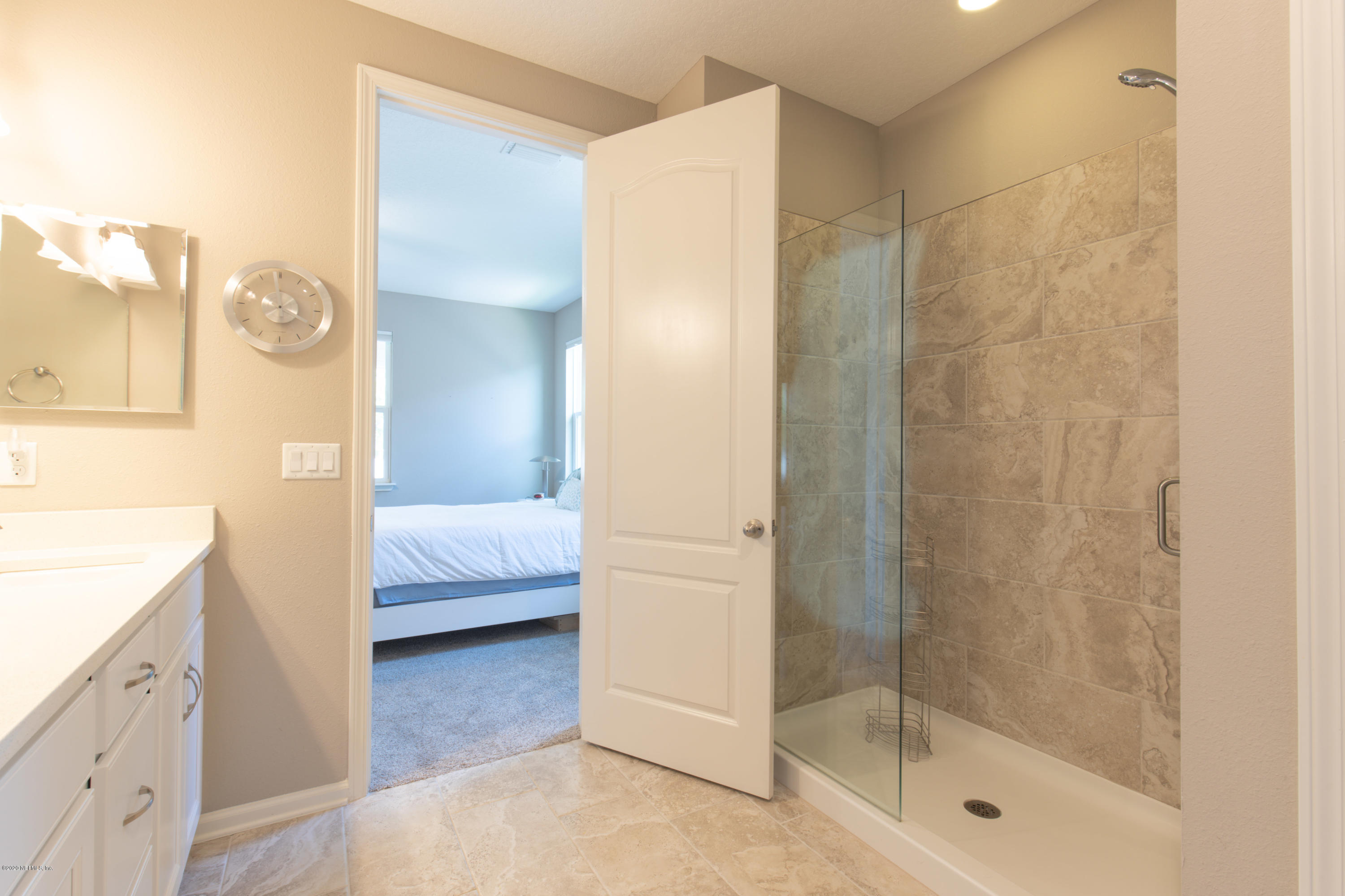 6642 Azalea Park Road Jacksonville, FL 32259 - Photo 24 of 42 a en suite bathroom with a shower and a tub