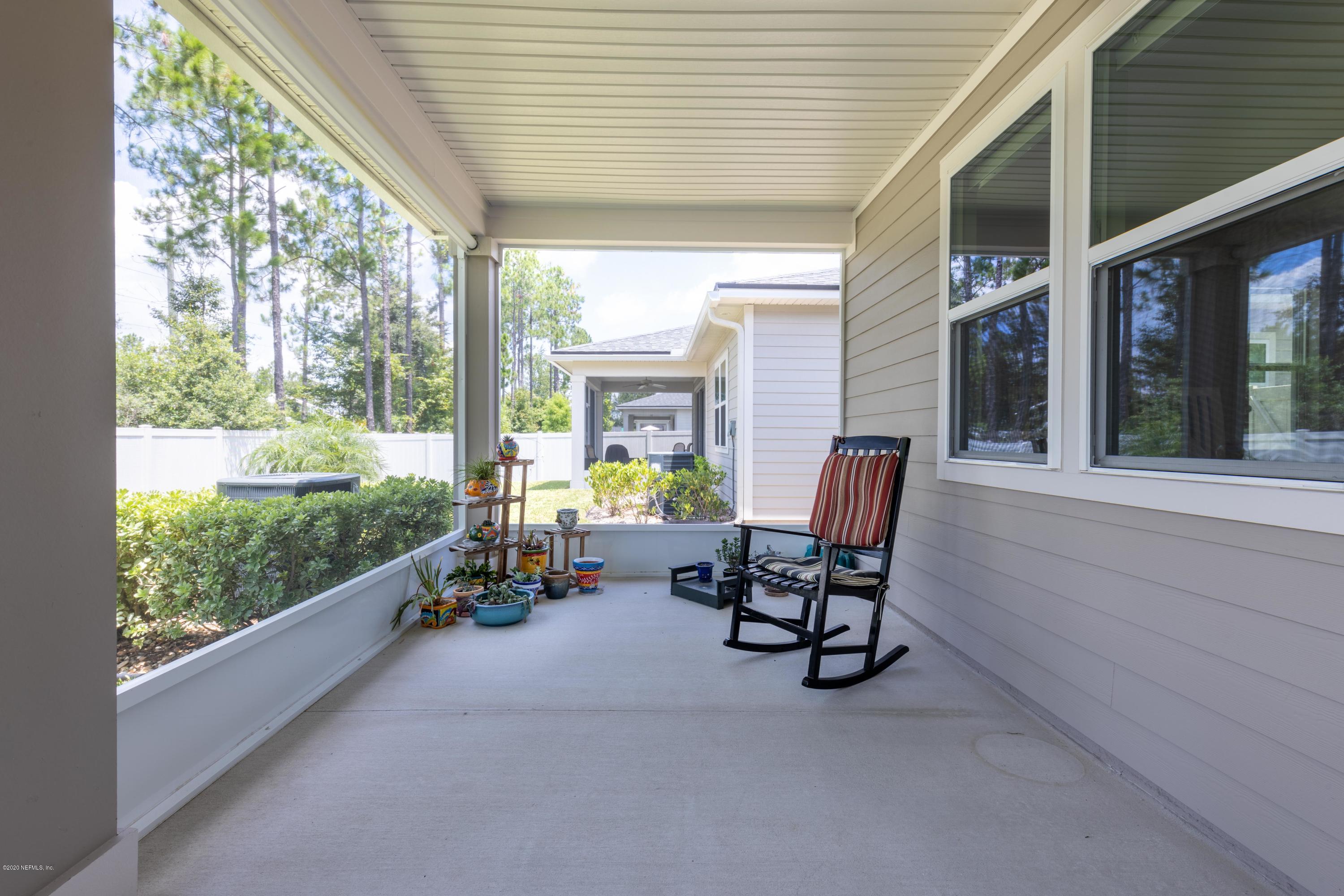 6642 Azalea Park Road Jacksonville, FL 32259 - Photo 26 of 42 a view of two chairs in the balcony