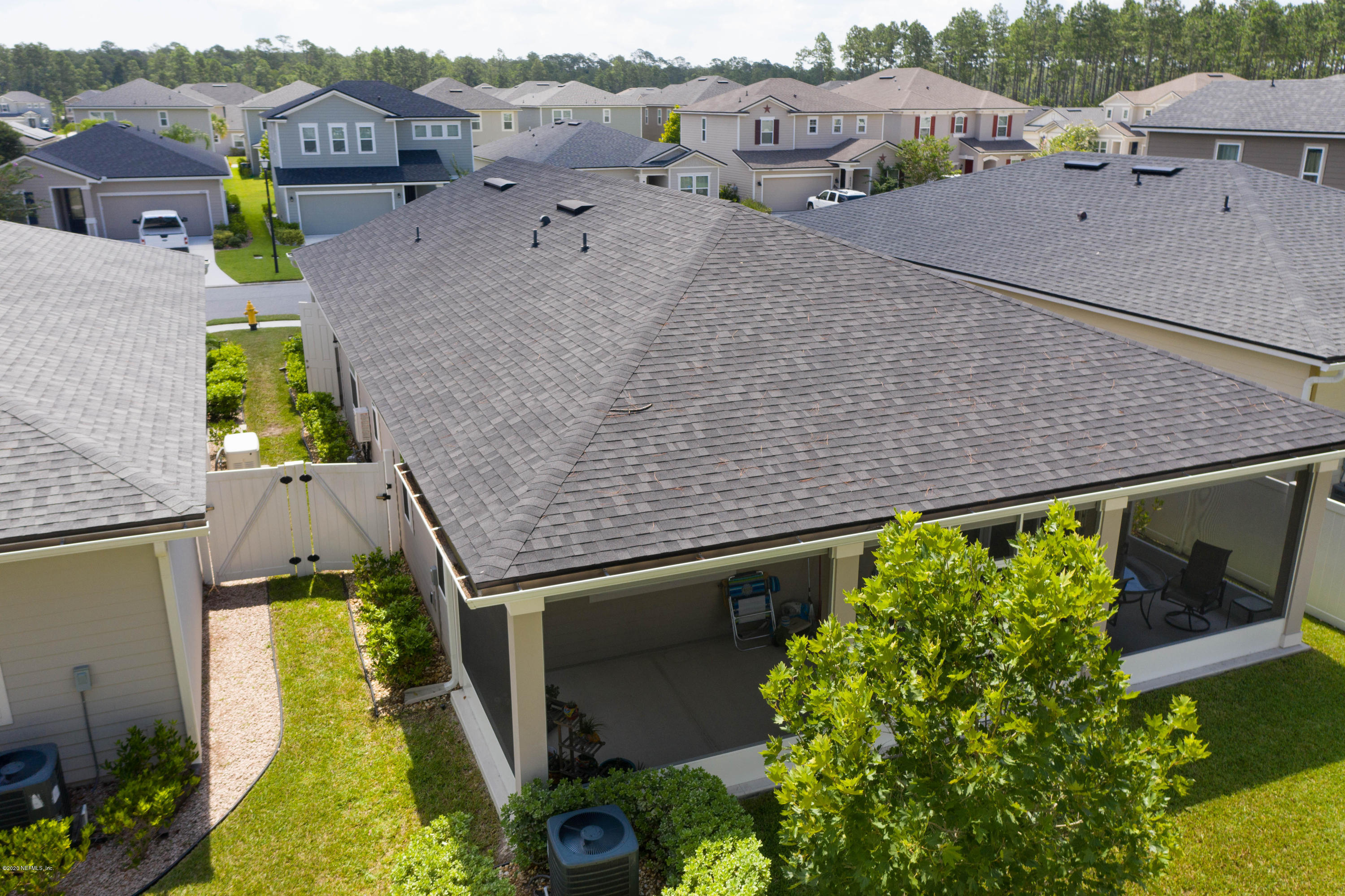 6642 Azalea Park Road Jacksonville, FL 32259 - Photo 31 of 42 an aerial view of multiple houses with yard