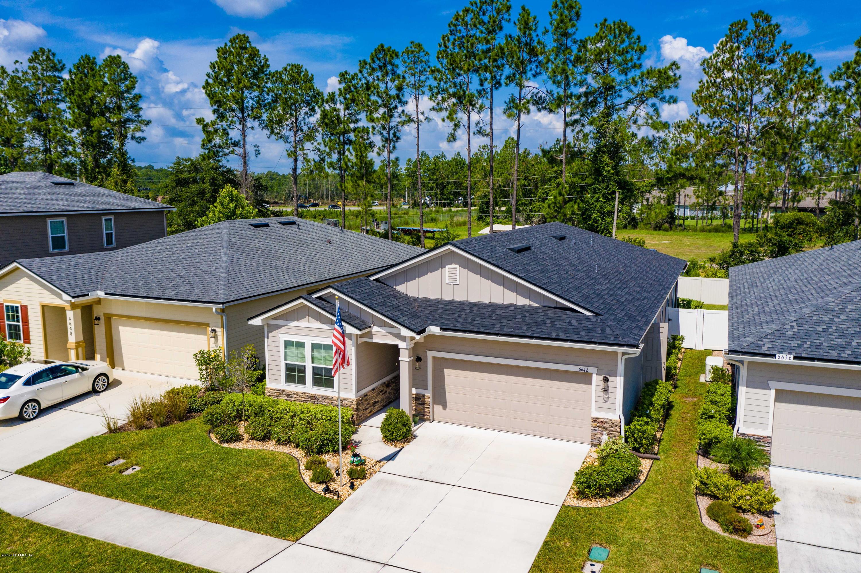 6642 Azalea Park Road Jacksonville, FL 32259 - Photo 36 of 42 a house view with a garden space