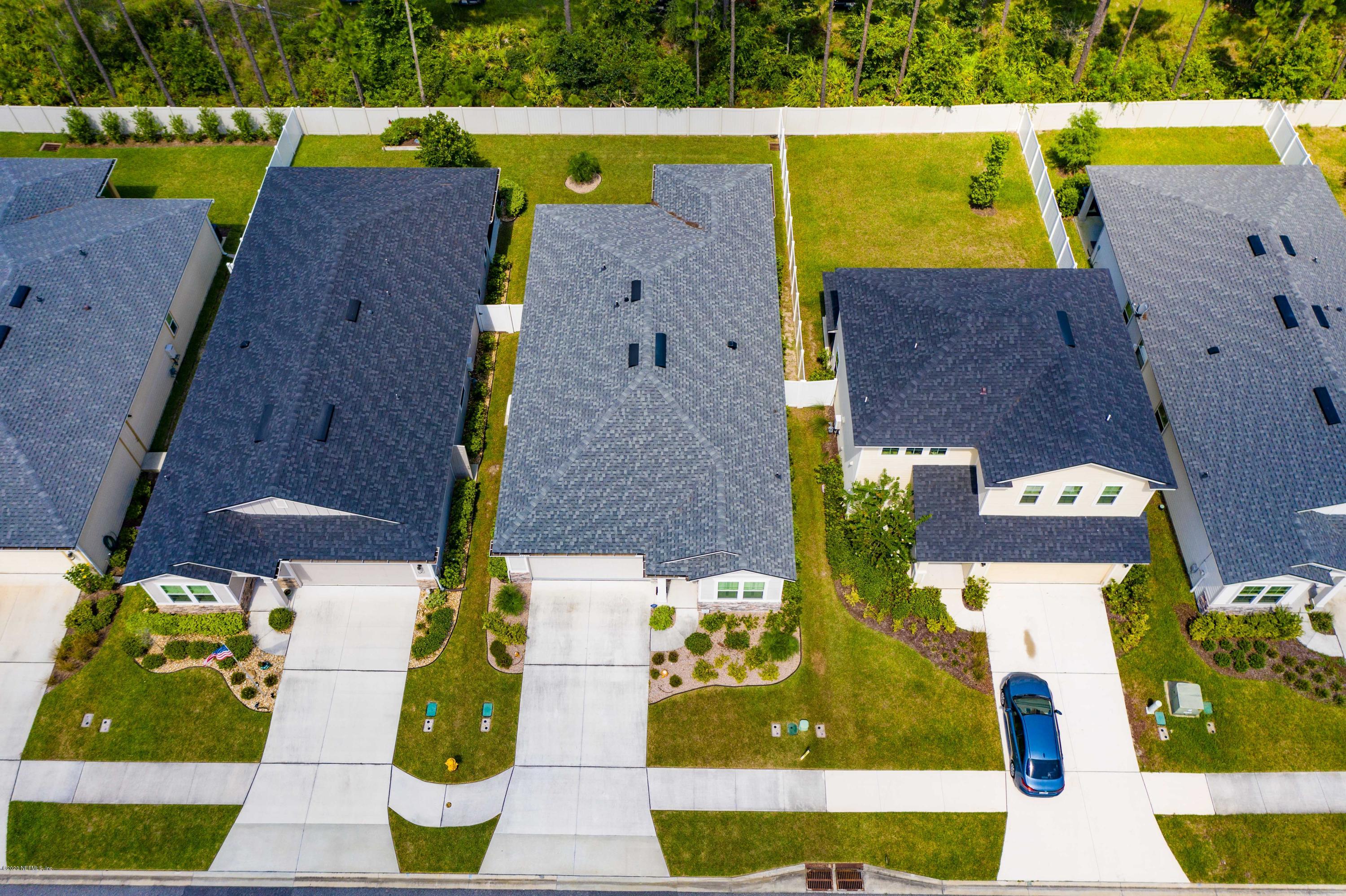 6642 Azalea Park Road Jacksonville, FL 32259 - Photo 40 of 42 an aerial view of house with a yard