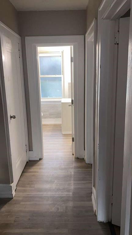 1408 Broadway Avenue McKees Rocks, PA 15136 - Photo 11 of 17 a view of empty room with wooden floor and fan