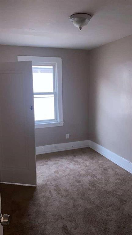 1408 Broadway Avenue McKees Rocks, PA 15136 - Photo 12 of 17 an empty room with a window
