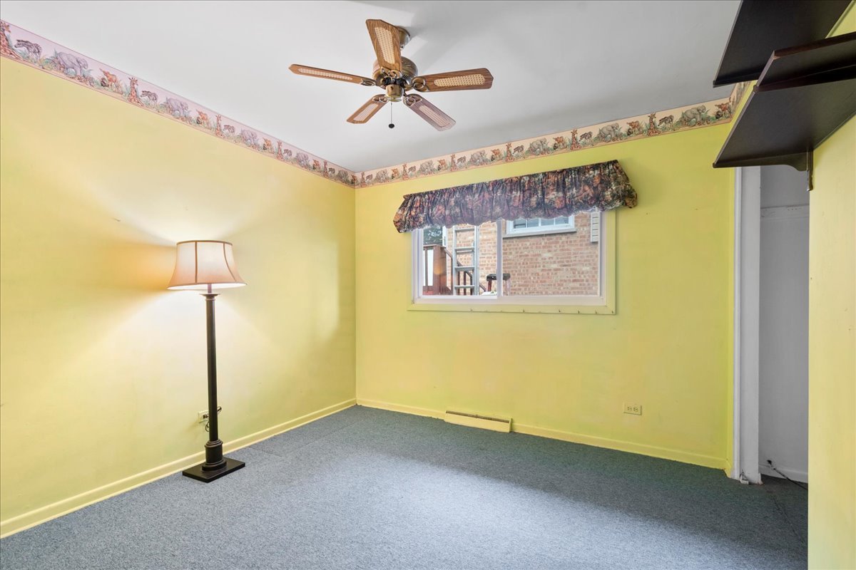 6638 Hazel Street Morton Grove, IL 60053 - Photo 12 of 19 a view of a room with gym equipment