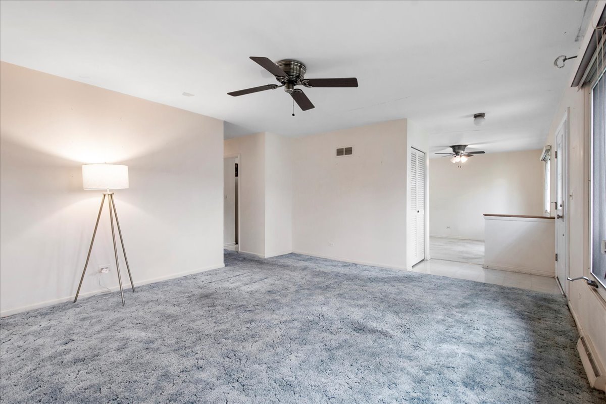 6638 Hazel Street Morton Grove, IL 60053 - Photo 5 of 19 a view of an empty room