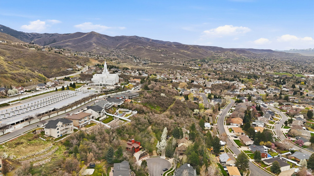 331 South 1550th Street East, Unit 3 Bountiful, UT 84010 - Photo 11 of 30 Aerial perspective of suburban area featuring mountains