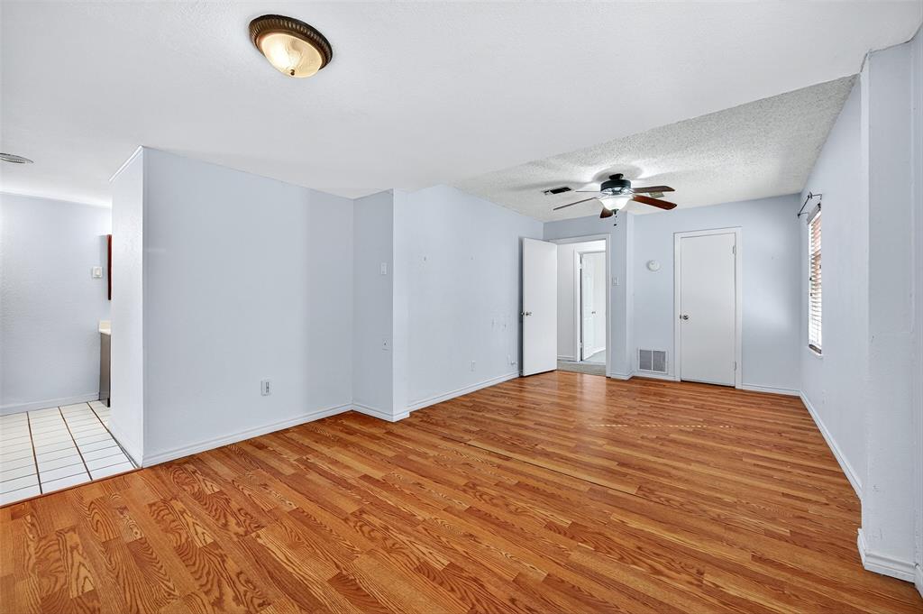 606 South Gordon Street Sherman, TX 75092 - Photo 15 of 22 a view of empty room with wooden floor