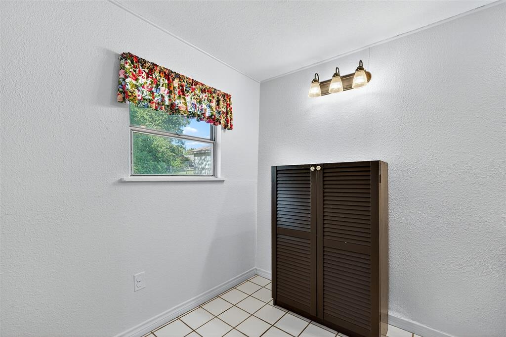 606 South Gordon Street Sherman, TX 75092 - Photo 18 of 22 a view of an empty room with a window