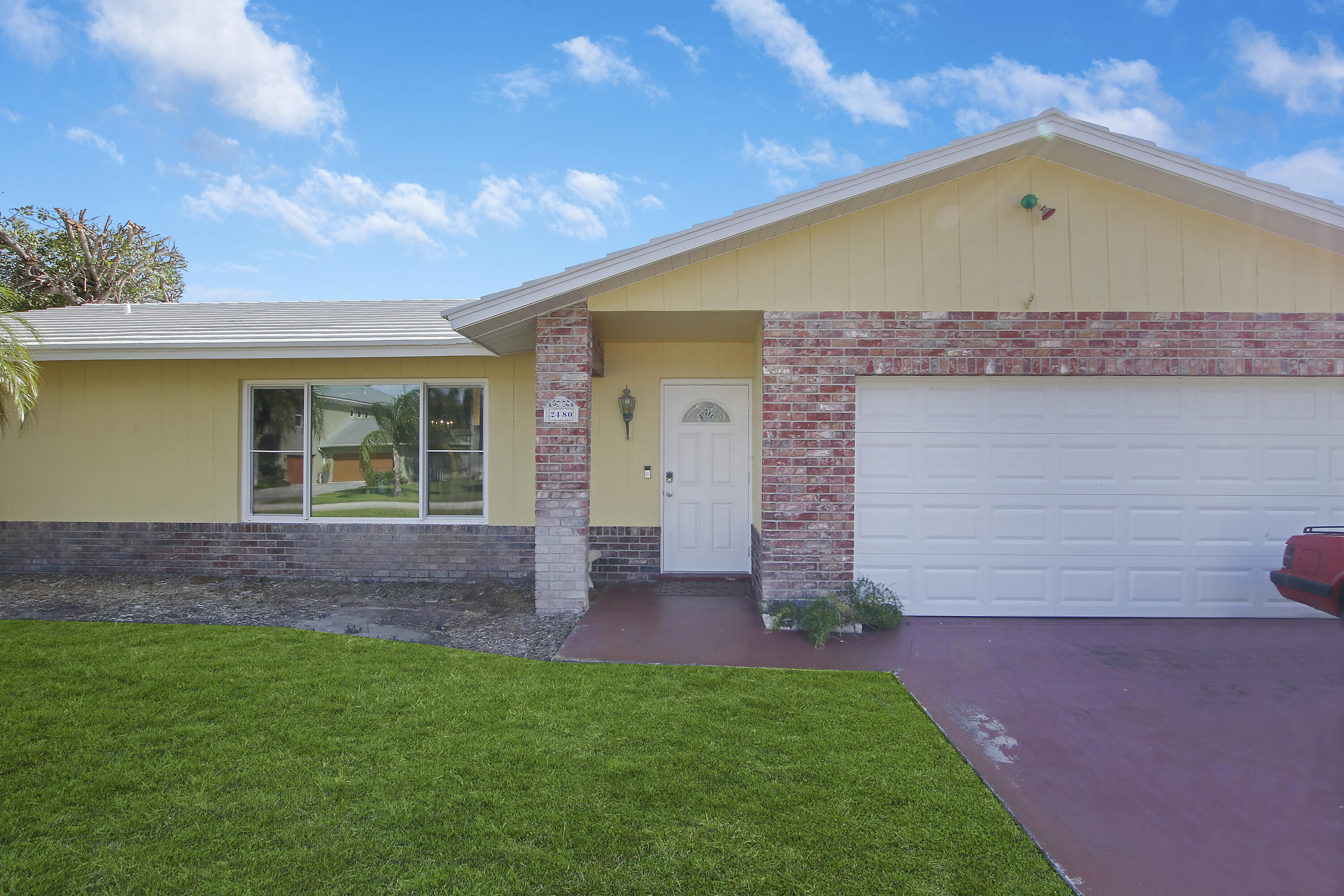 2480 Windsor Road Palm Beach Gardens, FL 33410 - Photo 4 of 44 Front elevation