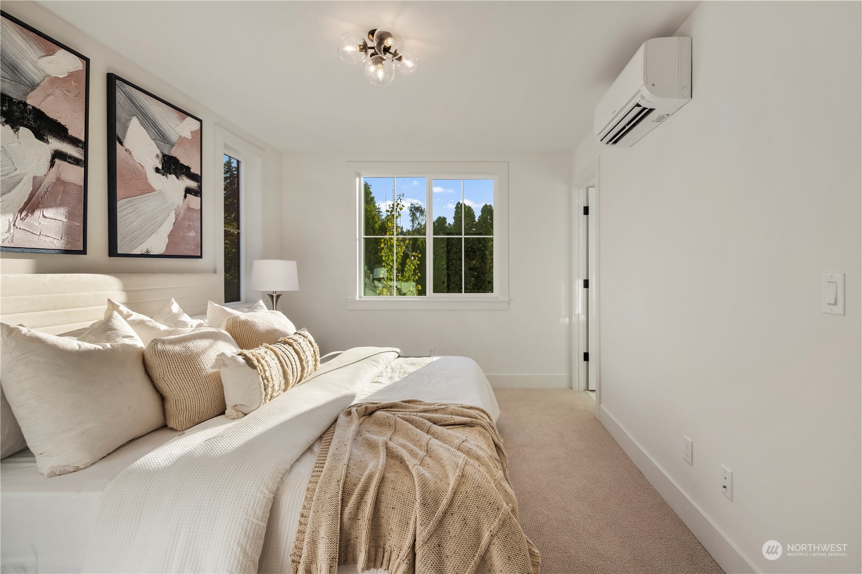 3014 East Howell Street Seattle, WA 98122 - Photo 17 of 39 a bedroom with a large bed and a window