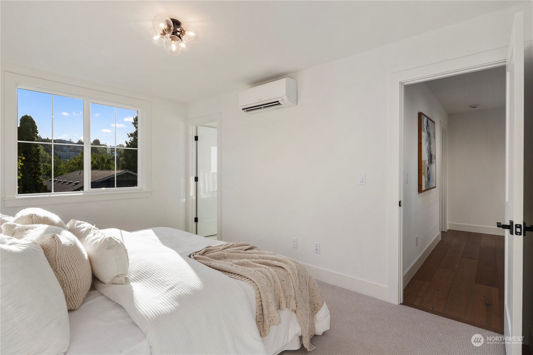 3014 East Howell Street Seattle, WA 98122 - Photo 18 of 39 a bedroom with a large bed and a window