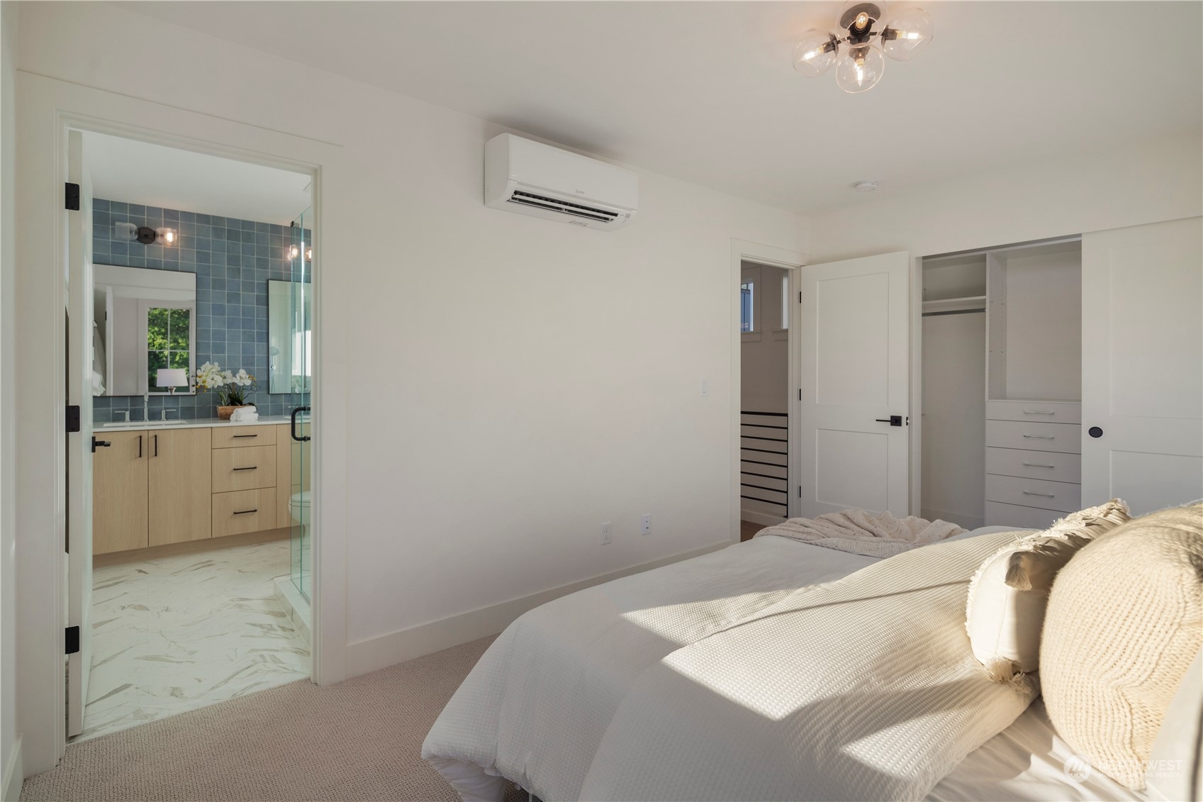 3014 East Howell Street Seattle, WA 98122 - Photo 19 of 39 a bedroom with a bed and a view of bathroom