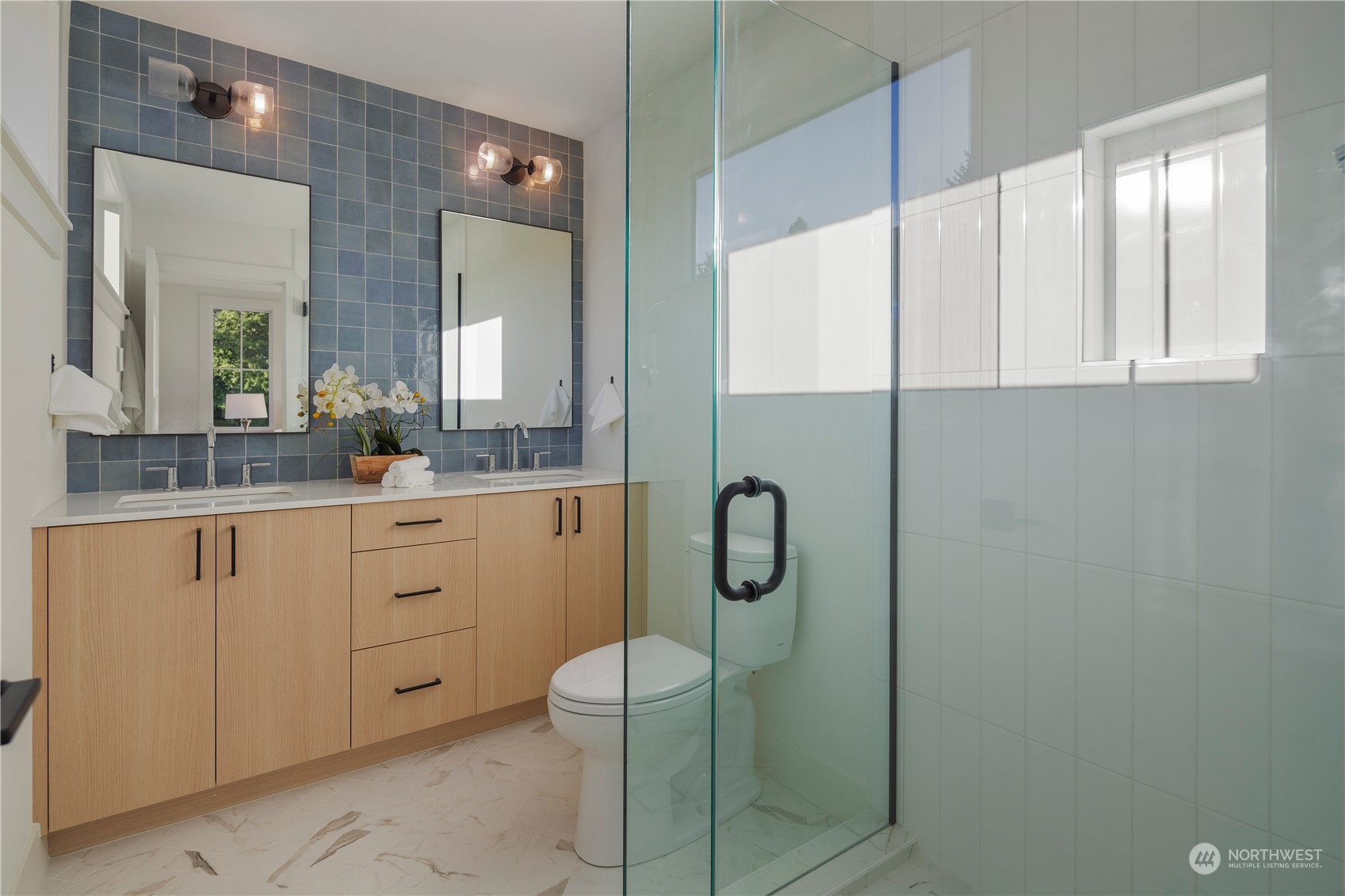 3014 East Howell Street Seattle, WA 98122 - Photo 20 of 39 a bathroom with a shower sink and mirror