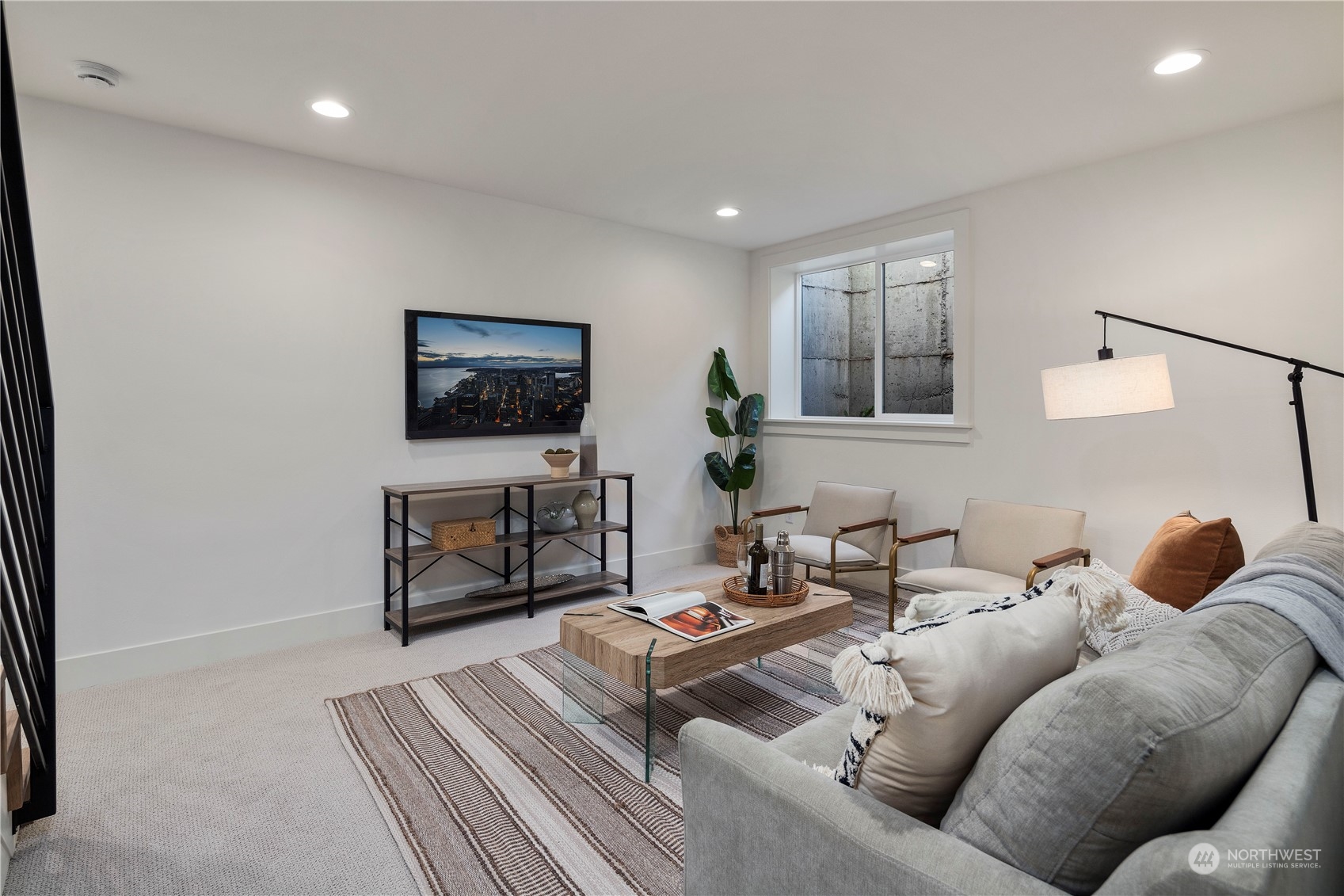 3014 East Howell Street Seattle, WA 98122 - Photo 26 of 39 a living room with furniture and a flat screen tv
