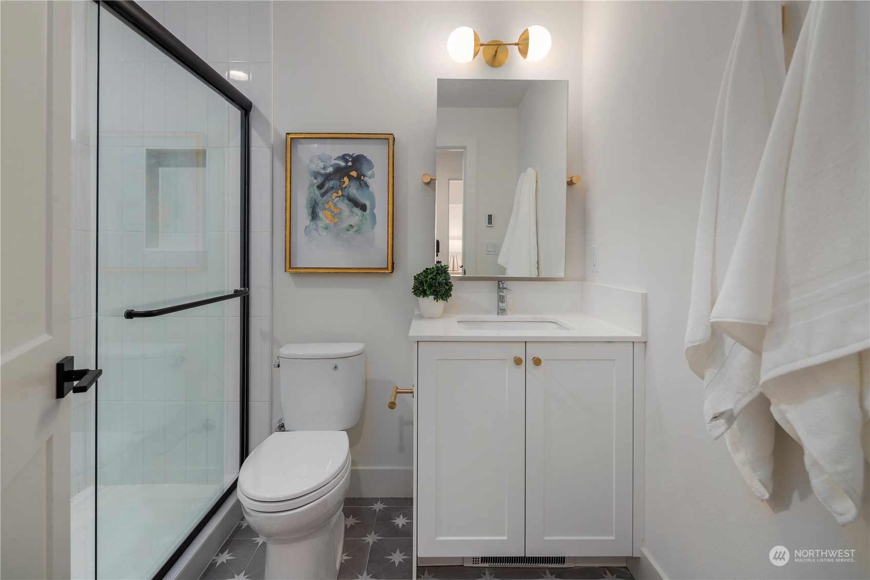 3014 East Howell Street Seattle, WA 98122 - Photo 32 of 39 a bathroom with a toilet sink and vanity