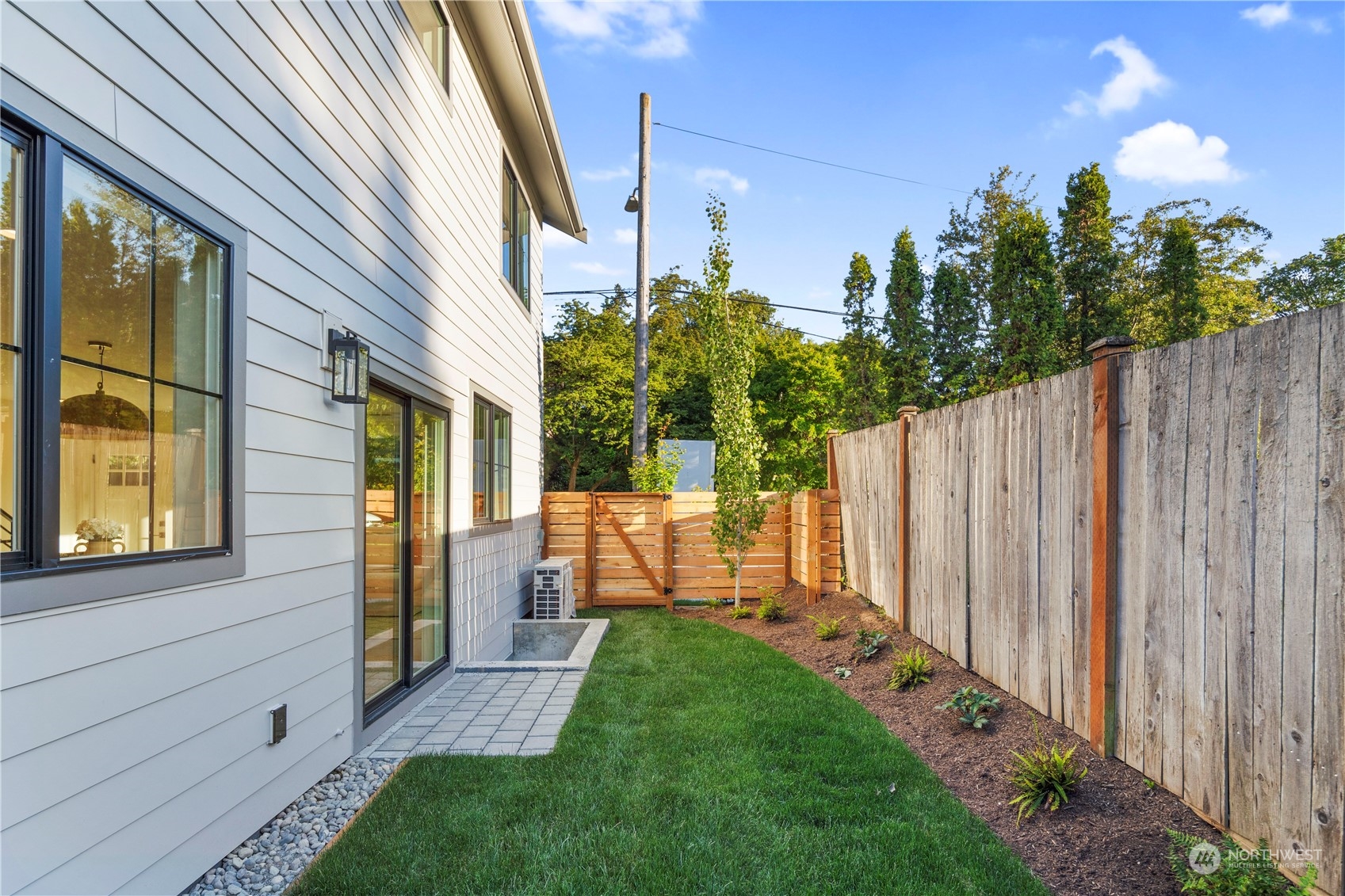 3014 East Howell Street Seattle, WA 98122 - Photo 35 of 39 a view of a house with backyard and sitting area
