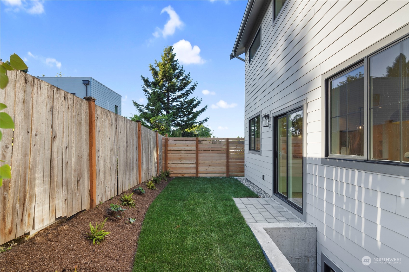 3014 East Howell Street Seattle, WA 98122 - Photo 37 of 39 a view of a backyard with wooden fence