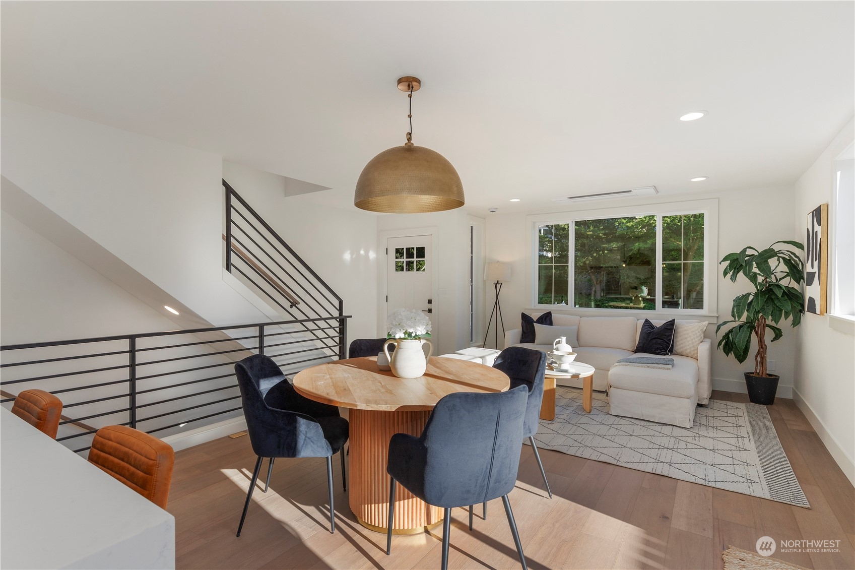 3014 East Howell Street Seattle, WA 98122 - Photo 8 of 39 a living room with furniture a table and a large window