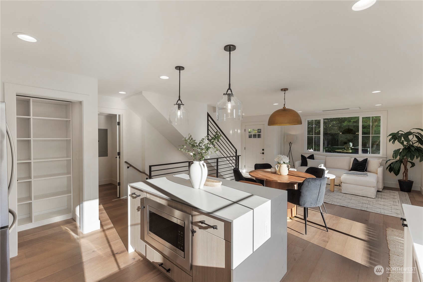3014 East Howell Street Seattle, WA 98122 - Photo 9 of 39 a kitchen with a stove and a wooden floor