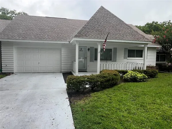 a view of a house with garden