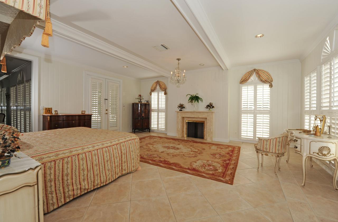 202 Indian Road Palm Beach, FL 33480 - Photo 14 of 24 a living room with furniture and a fireplace