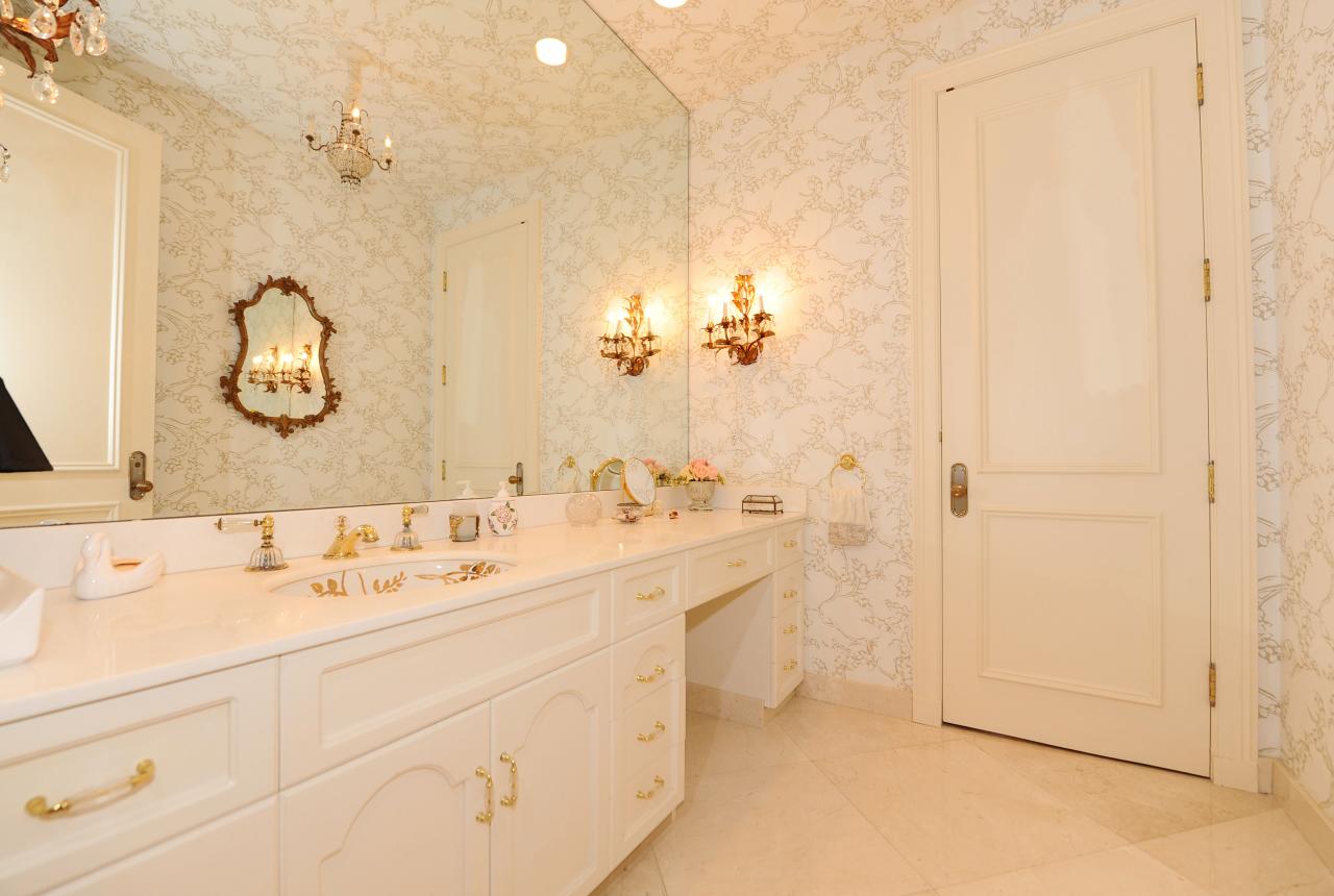 202 Indian Road Palm Beach, FL 33480 - Photo 16 of 24 a bathroom with a sink and a mirror