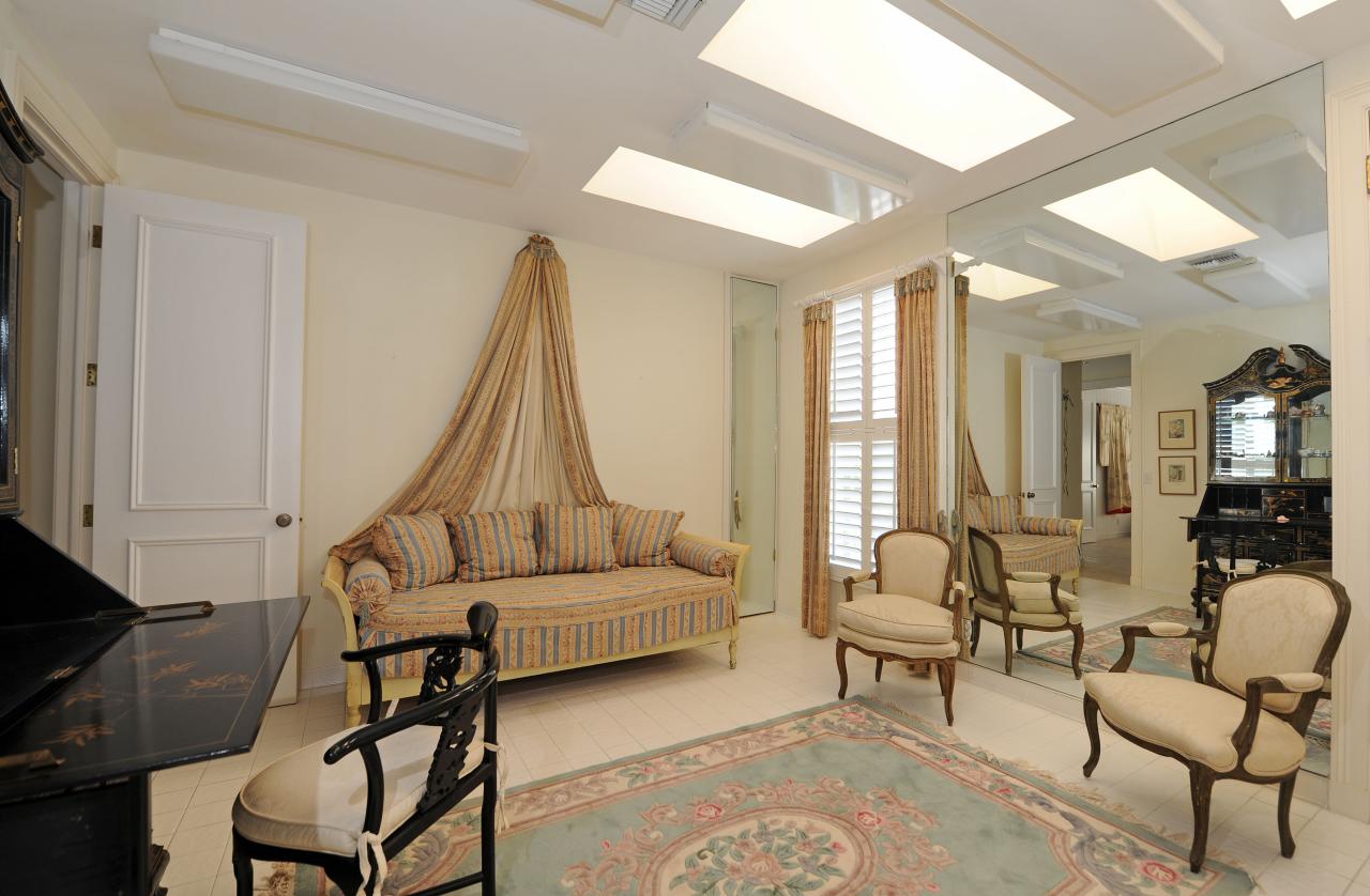 202 Indian Road Palm Beach, FL 33480 - Photo 17 of 24 a living room with furniture and a fireplace