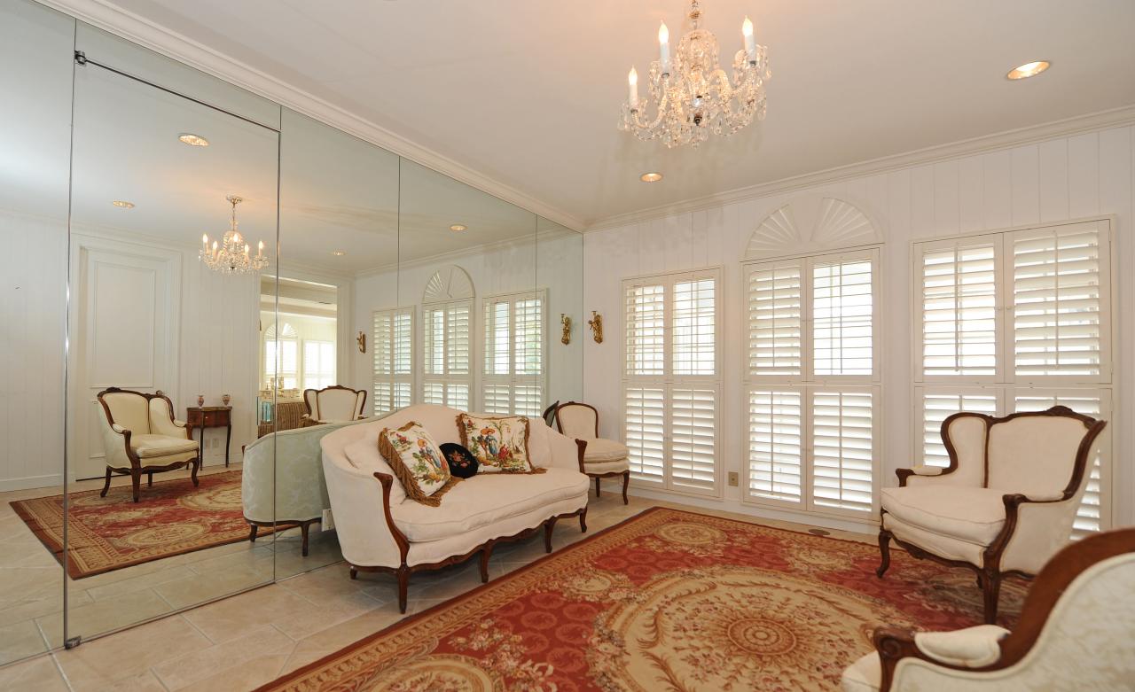 202 Indian Road Palm Beach, FL 33480 - Photo 18 of 24 a living room with furniture and a large window