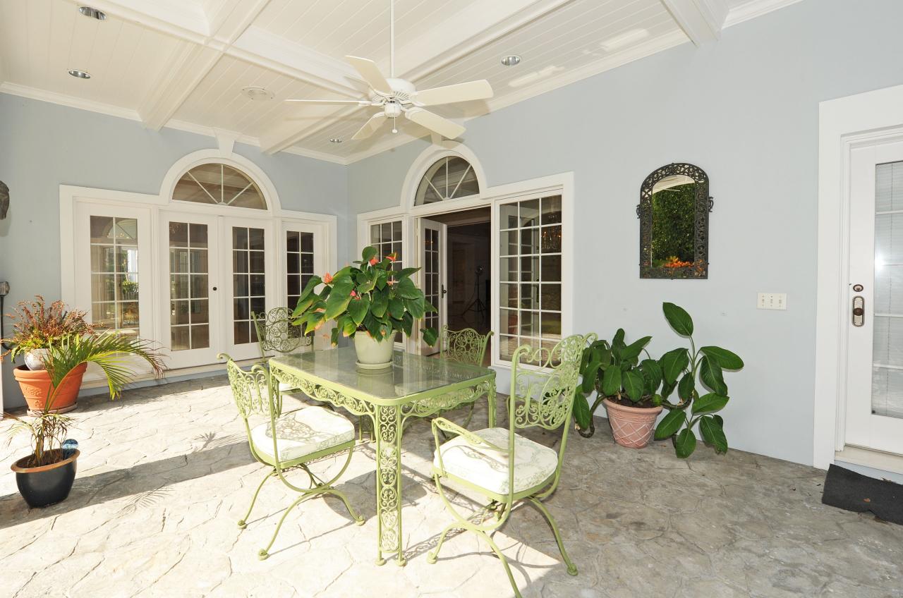 202 Indian Road Palm Beach, FL 33480 - Photo 22 of 24 a view of a livingroom with furniture and a potted plant