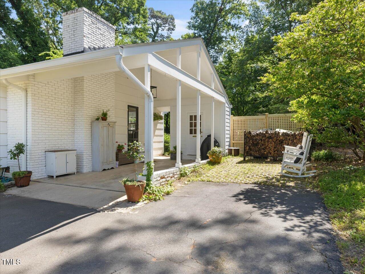 4112 Rowan Street Raleigh, NC 27609 - Photo 25 of 35 a view of a house with a patio