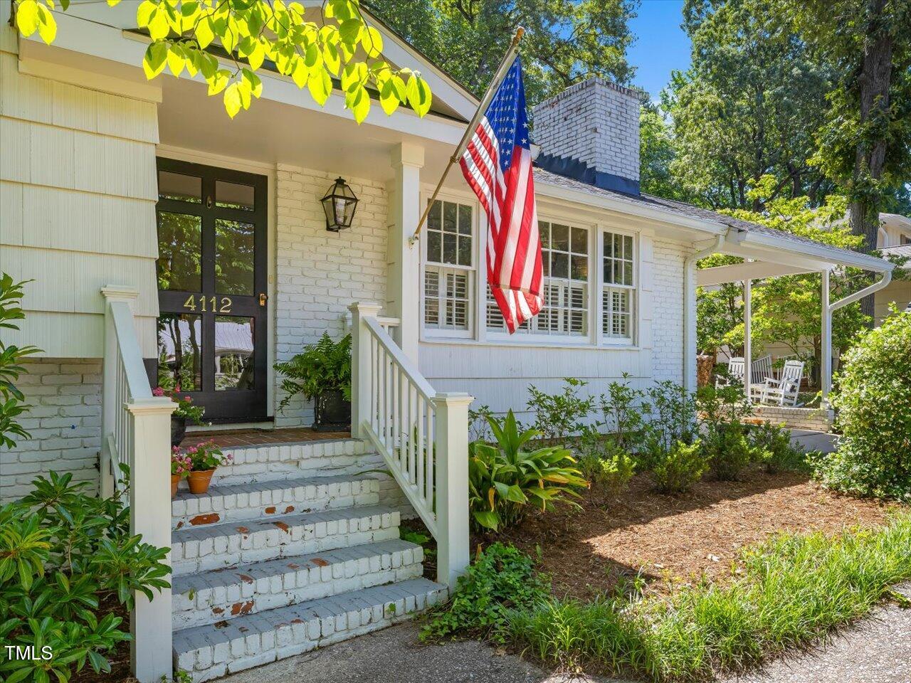 4112 Rowan Street Raleigh, NC 27609 - Photo 3 of 35 a front view of a house with garden