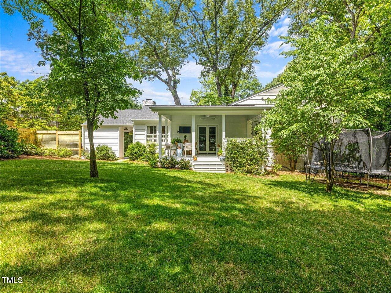 4112 Rowan Street Raleigh, NC 27609 - Photo 31 of 35 a front view of house with yard and green space