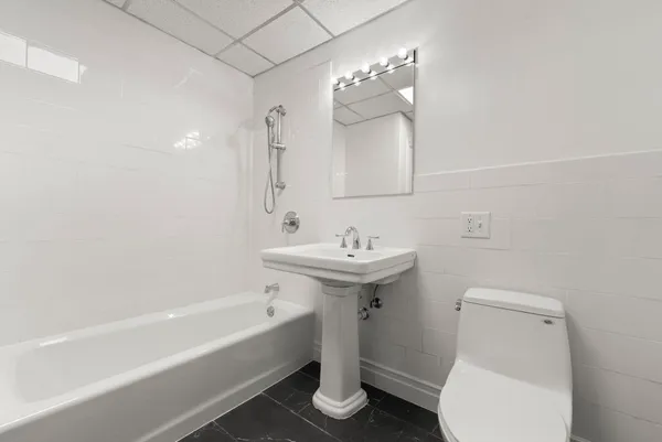 a hallway with washer and dryer