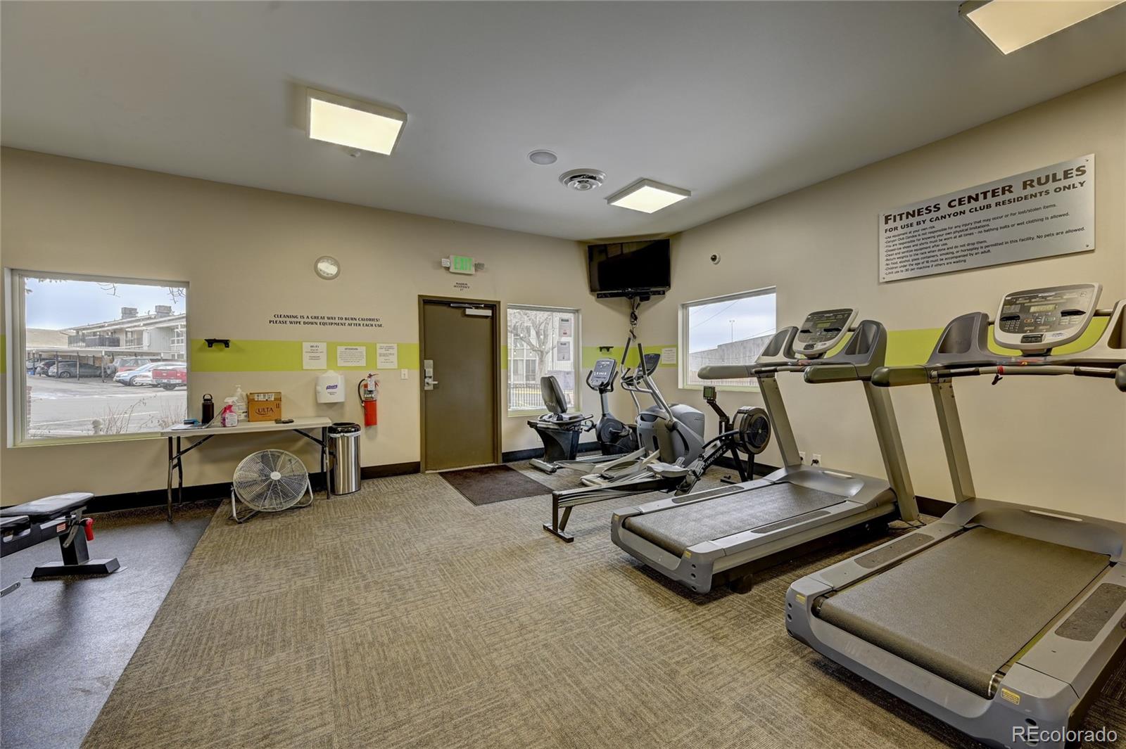 6495 East Happy Canyon Road, Unit 174 Denver, CO 80237 - Photo 30 of 32 a view of a room with gym equipment