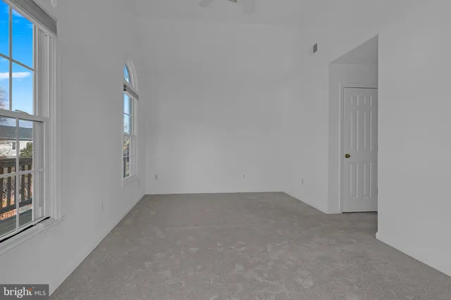 an empty room with an entryway