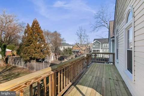 a view of a houses on the roof deck