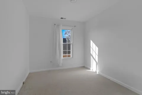 a view of empty room with window