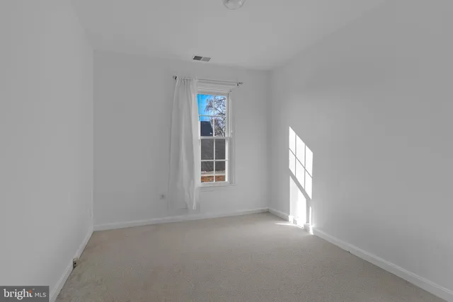 a view of empty room with window
