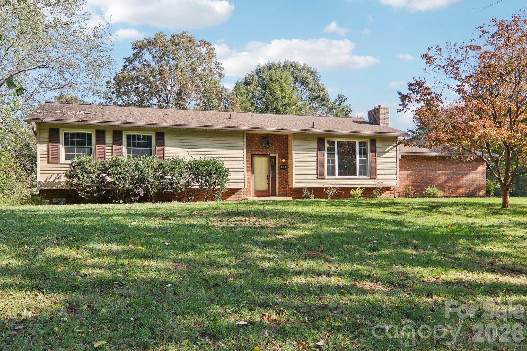 261 Eastview Road Brevard, NC 28712 - Photo 4 of 15 front view of a house with a garden
